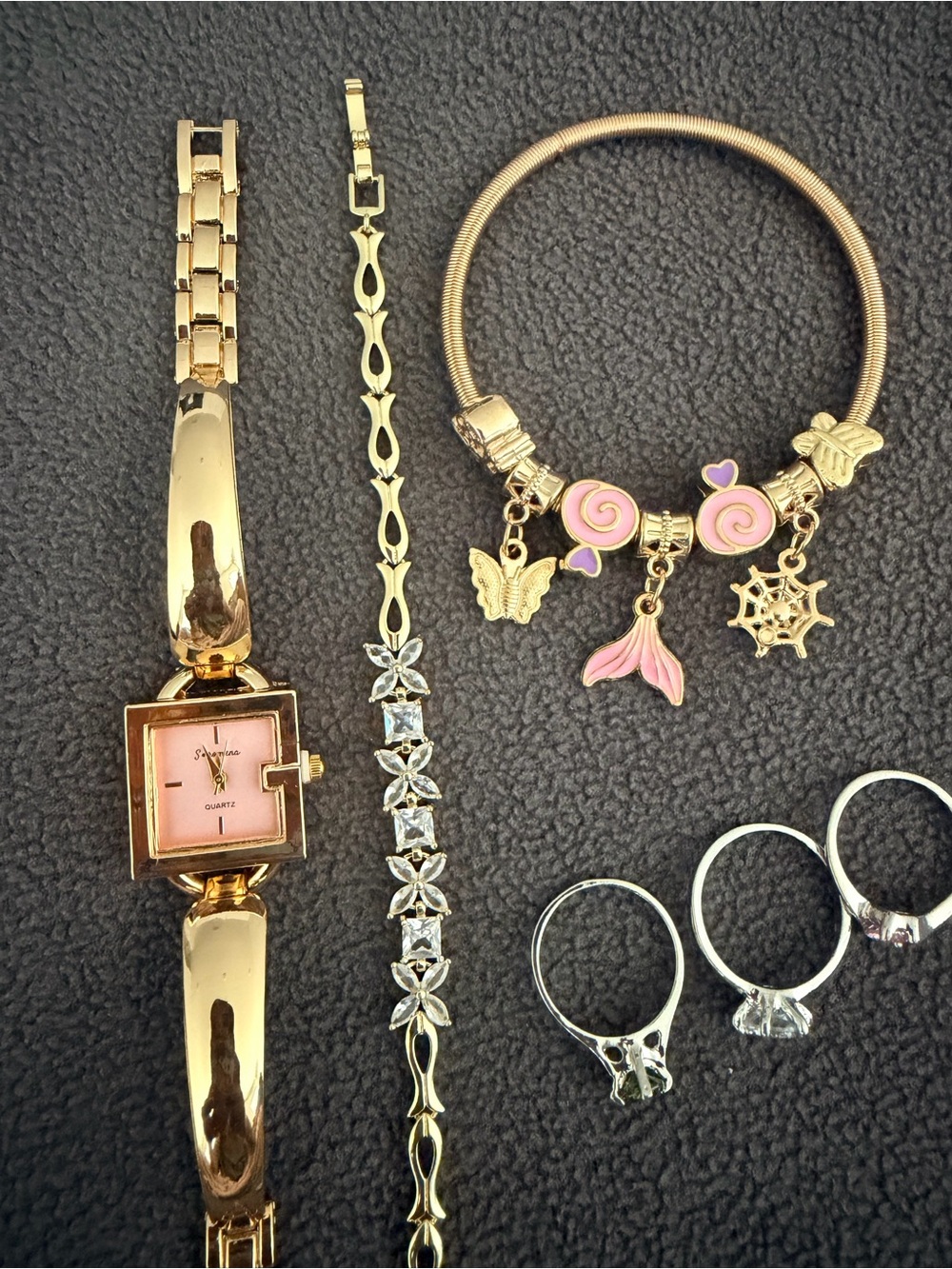 Gold-Tone Charm Bracelet with Pink Enamel Accents